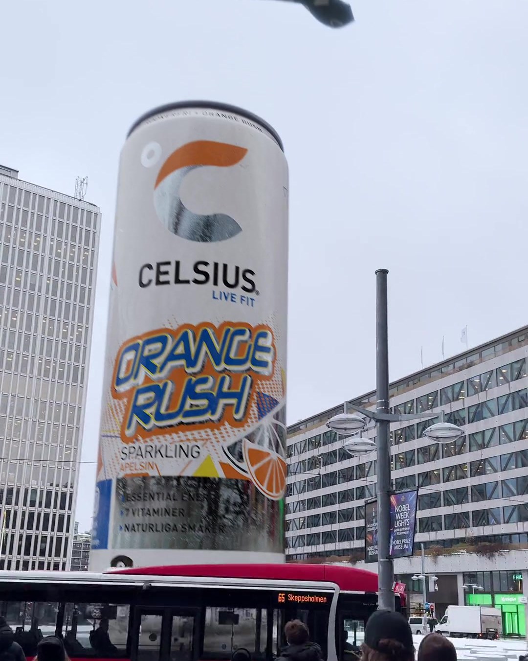 Orange Rush at Sergels torg. The can and the cloth are 3D. The square, the crowd and the bus were filmed for real.